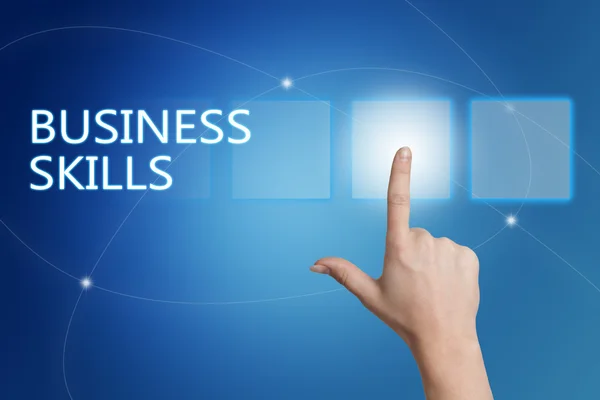 Business Skills - hand pressing button on interface with blue background. — Stok fotoğraf