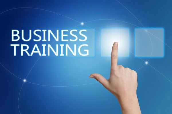 Business Training - premere a mano il pulsante sull'interfaccia con sfondo blu . — Foto Stock