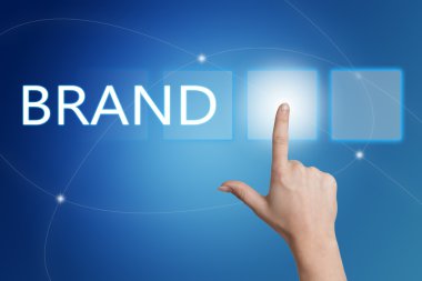 Brand - hand pressing button on interface with blue background.