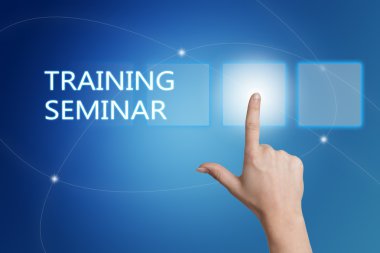 Training Seminar - hand pressing button on interface with blue background.