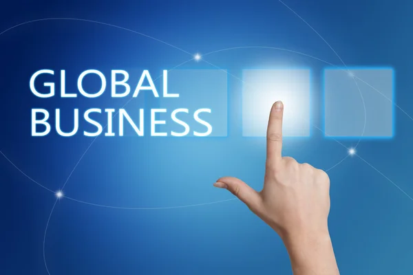 Global Business - hand pressing button on interface with blue background. — Stockfoto