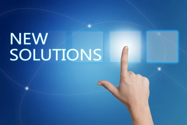 New Solutions - hand pressing button on interface with blue background. — Φωτογραφία Αρχείου