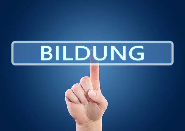 Bildung - palabra alemana para la educación - pulsar el botón de mano en la interfaz con fondo azul . —  Fotos de Stock