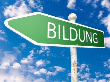 Bildung - german word for education - street sign illustration in front of blue sky with clouds.