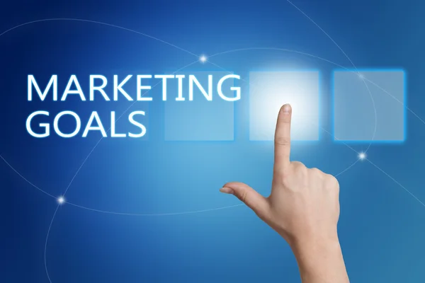 Marketing Goals - hand pressing button on interface with blue background. — Stok fotoğraf