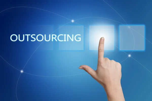 Outsourcing - hand pressing button on interface with blue background. — Zdjęcie stockowe