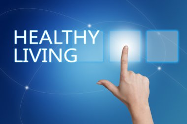 Healthy Living - hand pressing button on interface with blue background.