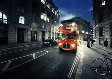 old bus on street of London clipart
