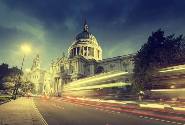 St Paul's Cathedral and moving Double Decker bus, London, UK Stock Picture