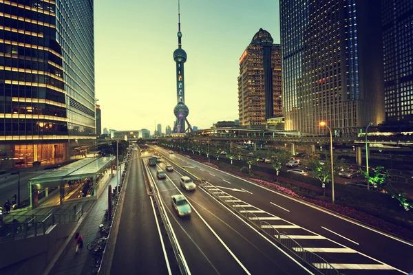 Road in sunset time, Shanghai lujiazui financial center — Stock Photo, Image