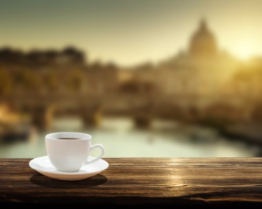 cup of coffee and St Peter Basilica in Vatican clipart