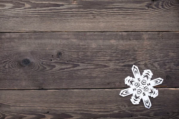 Kerstmis houten achtergrond met sneeuwvlokken — Stockfoto