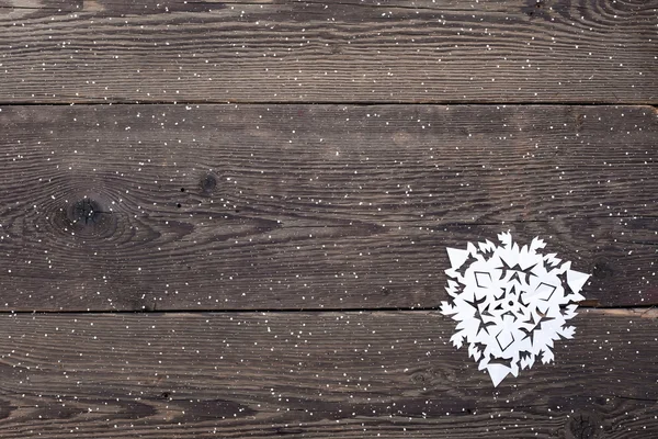 Fondo de madera de Navidad con copos de nieve —  Fotos de Stock