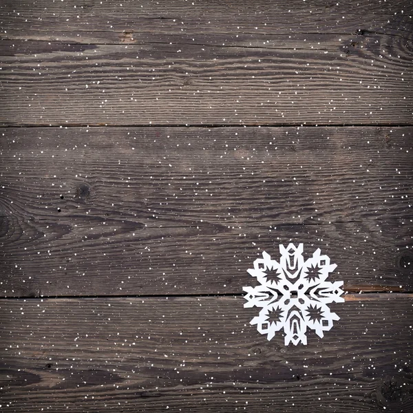 Kerstmis houten achtergrond met sneeuwvlokken — Stockfoto