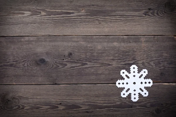 Christmas trä bakgrund med snöflingor — Stockfoto