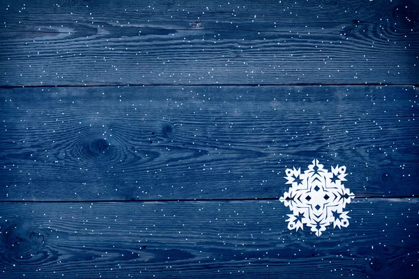 Christmas trä bakgrund med snöflingor — Stockfoto