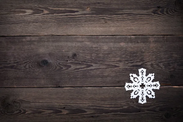 Christmas trä bakgrund med snöflingor — Stockfoto