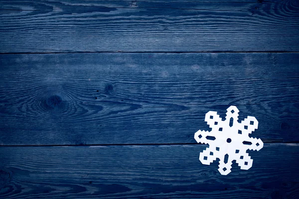 Christmas trä bakgrund med snöflingor — Stockfoto