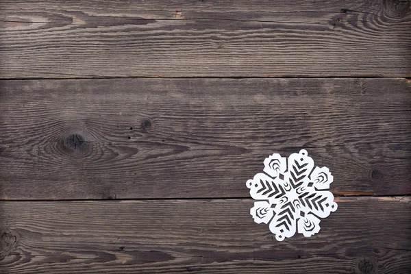 Christmas trä bakgrund med snöflingor — Stockfoto