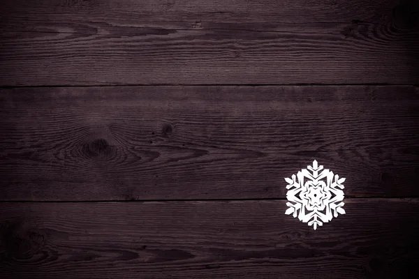 Natal fundo de madeira com flocos de neve — Fotografia de Stock