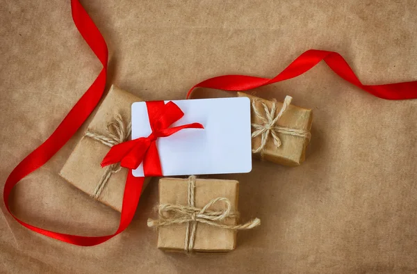 Üç sarılmış hediyeler, kutlama kartı Telifsiz Stok Fotoğraflar