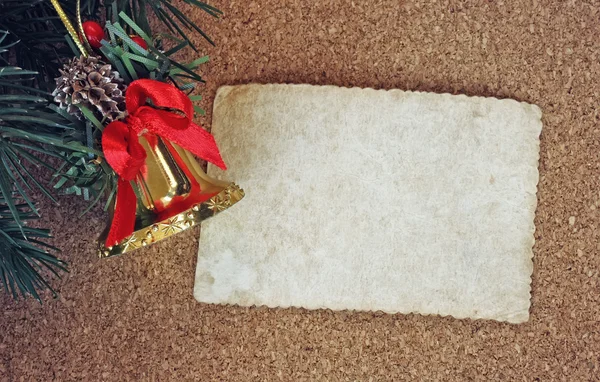 Vánoční zvonek, prázdný list papíru — Stock fotografie
