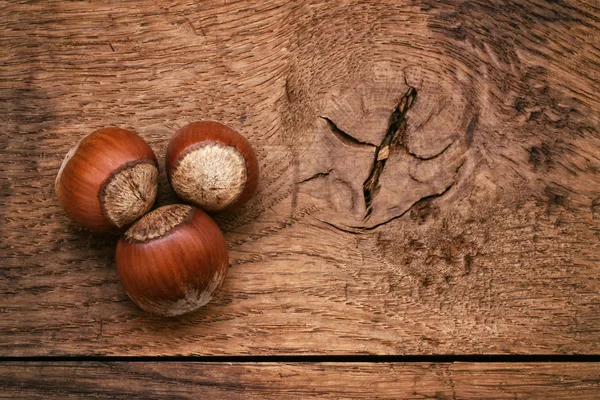 Three hazelnut on table — Stock Photo, Image