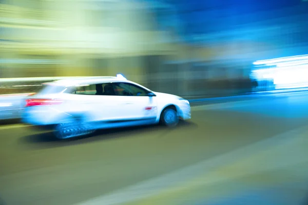 stock image Blurred motion of a Taxi in Rome