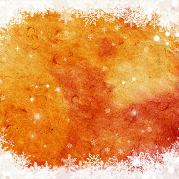 Сніг і зірки на гранжевому папері — стокове фото