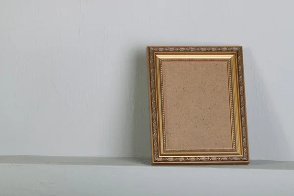 Golden photo frame with space — Stock Photo, Image