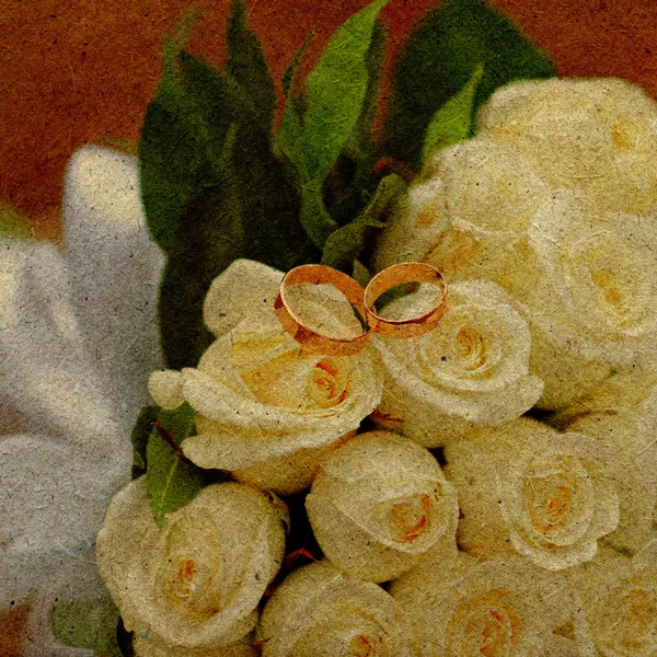 Fond romantique avec des roses et des anneaux — Photo