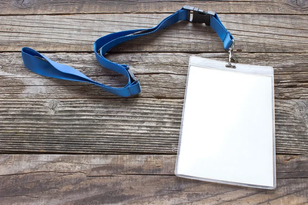 Blank ID card tag on wooden background — Stock Photo, Image