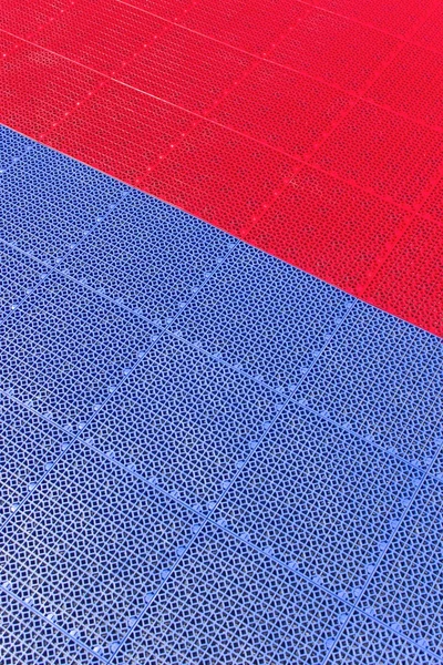Textura de plástico rojo y azul como fondo — Foto de Stock