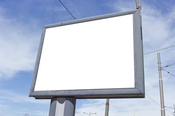 Blank billboard against blue sky and clouds Stock Image