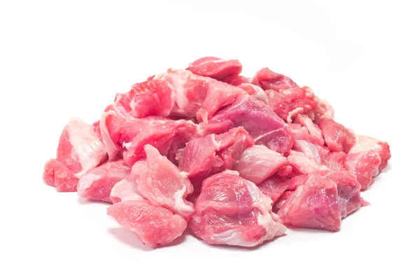 Мясо из рубленой свинины для гуляша, изолированного на белом — стоковое фото