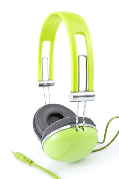Green headphones isolated on white — Stock Photo, Image