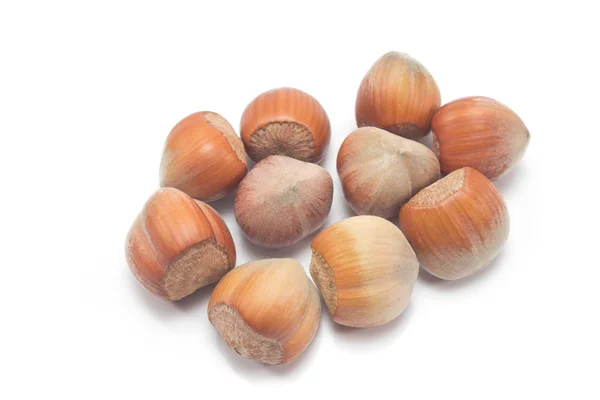 Pile of hazelnuts isolated on white — Stock Photo, Image