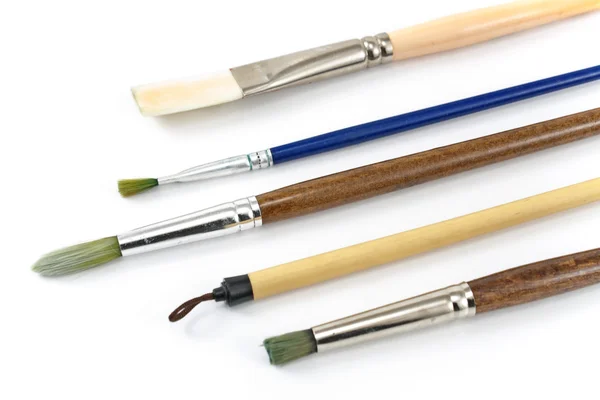 Artist paint brushes closeup on white background — Stock Photo, Image