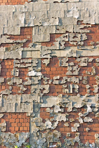 Peeling facade brick wall as background — Stock Photo, Image