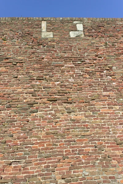 Fortress brick wall and sky as background — Stock Photo, Image