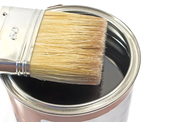 Paint brush and varnish can on white — Stock Photo, Image