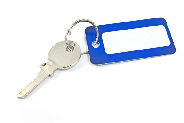 House key with blue tag isolated on white — Stock Photo, Image