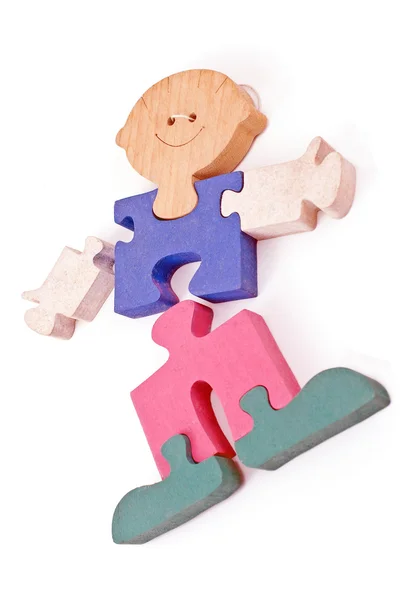 Барвисті дерев'яні хлопчик шматочки головоломки ізольовані на білому — стокове фото