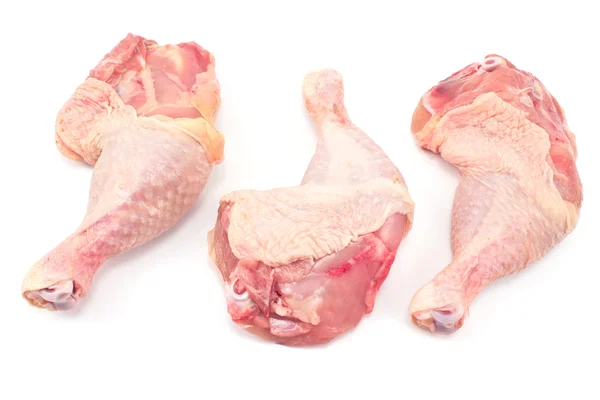 Jambes de poulet crues isolées sur blanc — Photo