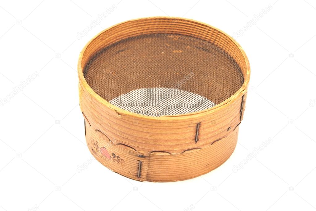 Old wooden sieve for flour isolated on white