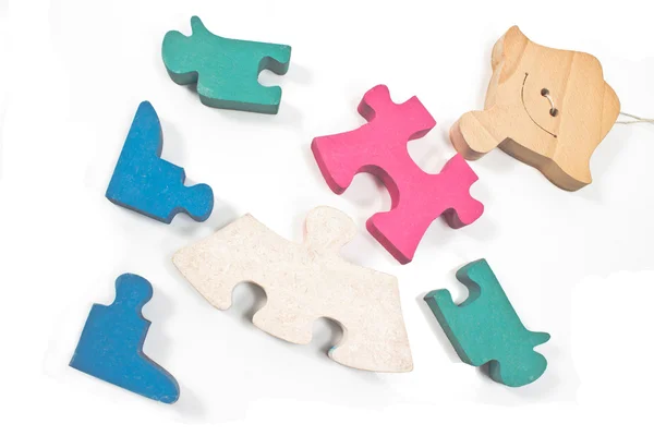 Colorful wooden girl puzzle pieces isolated on white — Stock Photo, Image