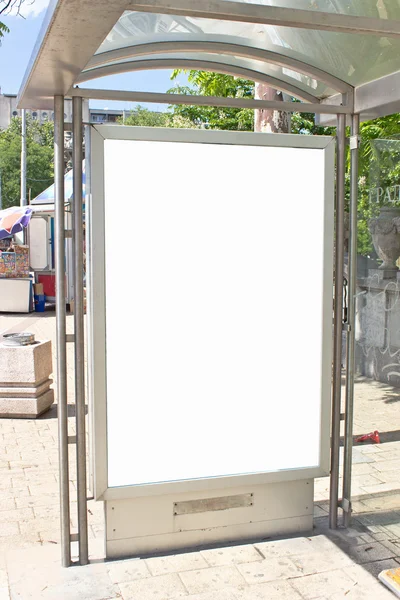 Blank white billboard sign on bus station