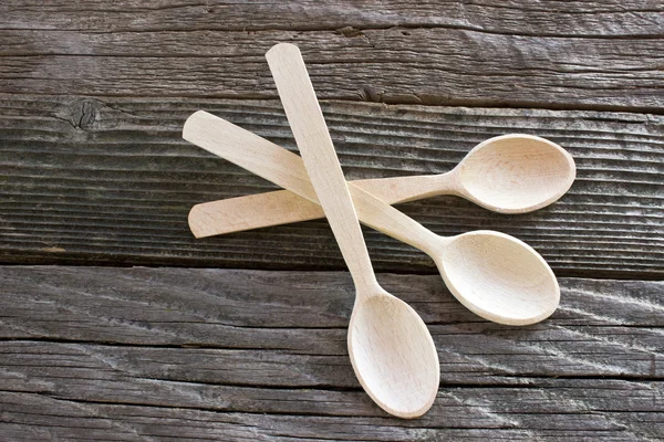 Wooden spoons on table — Stock Photo, Image