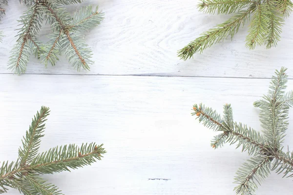 Christmas  pine  needles on wooden background — Stock Photo, Image