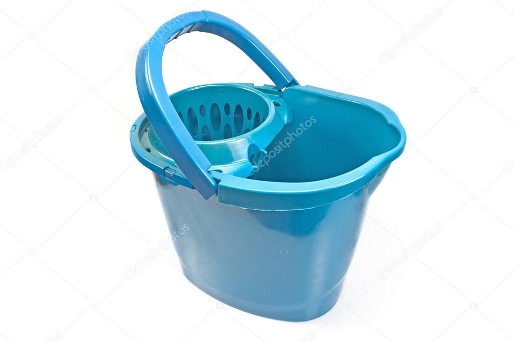 Blue bucket with mop squeezing  isolated on white
